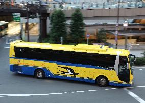 Bus wrapped with “Doctor Yellow”