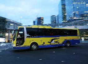 Bus wrapped with “Doctor Yellow”