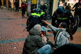 Dozens Detained After Protesters Defy Ban - Amsterdam