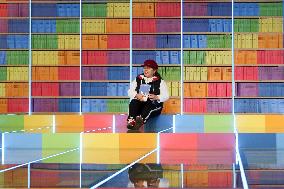 Rainbow Book Wall at Wuzhou Bookstore in Chongqing