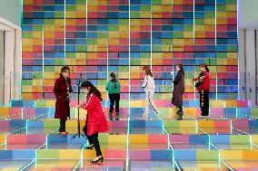 Rainbow Book Wall at Wuzhou Bookstore in Chongqing