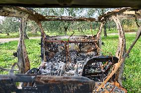 Burnt-Out Stolen Car In The Countryside Of Cerignola