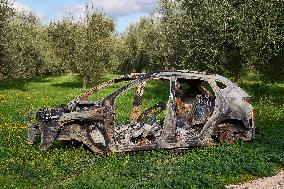 Burnt-Out Stolen Car In The Countryside Of Cerignola