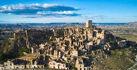 Drone Aerial View Of Craco: The Hauntingly Beautiful Ghost Town In Southern Italy