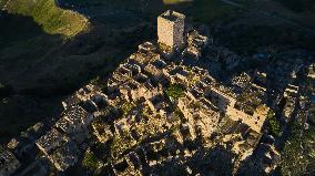 Drone Aerial View Of Craco: The Hauntingly Beautiful Ghost Town In Southern Italy