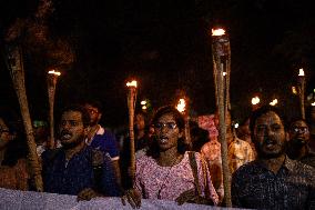 Torch Procession To Protest Brutal Murder Of A Female Garment Worker