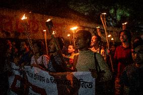 Torch Procession To Protest Brutal Murder Of A Female Garment Worker