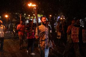 Torch Procession To Protest Brutal Murder Of A Female Garment Worker