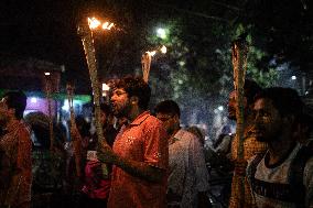 Torch Procession To Protest Brutal Murder Of A Female Garment Worker