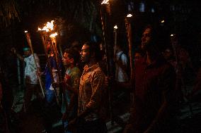 Torch Procession To Protest Brutal Murder Of A Female Garment Worker