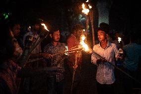 Torch Procession To Protest Brutal Murder Of A Female Garment Worker