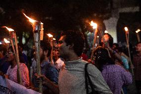 Torch Procession To Protest Brutal Murder Of A Female Garment Worker