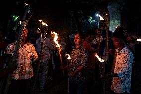 Torch Procession To Protest Brutal Murder Of A Female Garment Worker