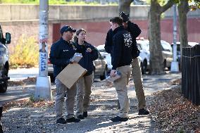 Evidence Markers At Scene Where A 21-year-old Man Was Fatally Stabbed At Steuben Park In Brooklyn New York