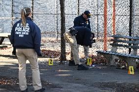 Evidence Markers At Scene Where A 21-year-old Man Was Fatally Stabbed At Steuben Park In Brooklyn New York