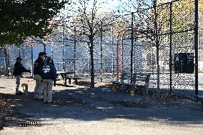 Evidence Markers At Scene Where A 21-year-old Man Was Fatally Stabbed At Steuben Park In Brooklyn New York