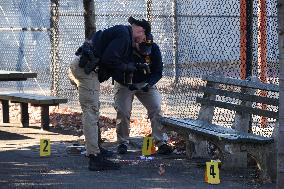 Evidence Markers At Scene Where A 21-year-old Man Was Fatally Stabbed At Steuben Park In Brooklyn New York