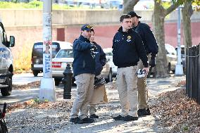 Evidence Markers At Scene Where A 21-year-old Man Was Fatally Stabbed At Steuben Park In Brooklyn New York