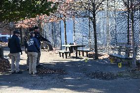 Evidence Markers At Scene Where A 21-year-old Man Was Fatally Stabbed At Steuben Park In Brooklyn New York