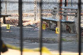 Evidence Markers At Scene Where A 21-year-old Man Was Fatally Stabbed At Steuben Park In Brooklyn New York