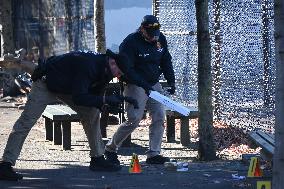 Evidence Markers At Scene Where A 21-year-old Man Was Fatally Stabbed At Steuben Park In Brooklyn New York