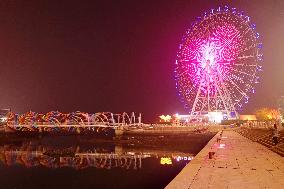 Tourists Play at Rainbow Bridge in Qingdao