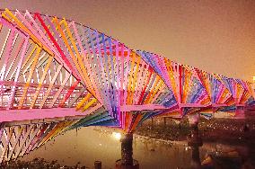 Tourists Play at Rainbow Bridge in Qingdao