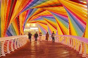 Tourists Play at Rainbow Bridge in Qingdao