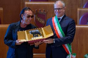 The Mayor Of Rome Roberto Gualtieri Delivers The Capitoline Wolf To Italian Singer-songwriter Antonello Venditti In The Giulio C