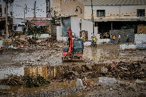 Houses And Businesses Near The Río Benamargosa Have Flooded.