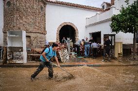 Houses And Businesses Near The Río Benamargosa Have Flooded.