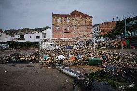 Houses And Businesses Near The Río Benamargosa Have Flooded.