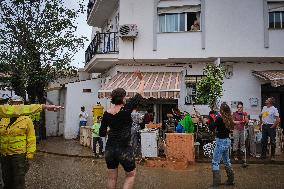 Houses And Businesses Near The Río Benamargosa Have Flooded.