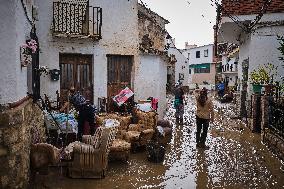 Houses And Businesses Near The Río Benamargosa Have Flooded.