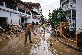 Houses And Businesses Near The Río Benamargosa Have Flooded.