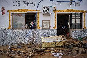 Houses And Businesses Near The Río Benamargosa Have Flooded.