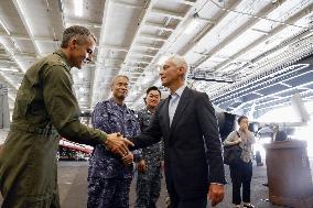 Emanuel visits U.S. aircraft carrier George Washington