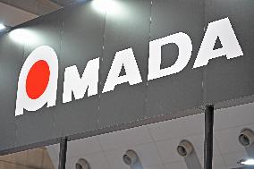 Amada signage, logo