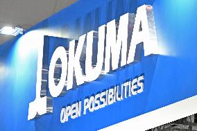 Okuma signage, logo