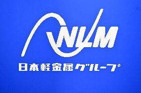 Nippon Light Metal Company signage, logo