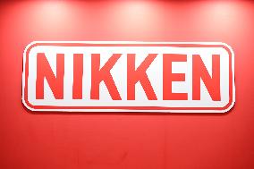 Nikken Kosakusho signage, logo