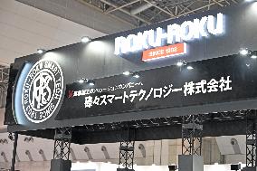 Roku Roku Smart Technology signboard and logo