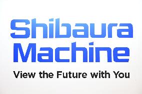 Shibaura Machinery signboard, logo