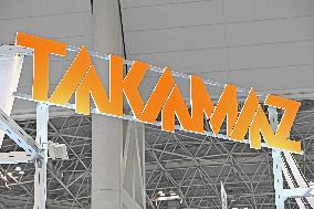 Takamatsu Machine Industry signboard, logo