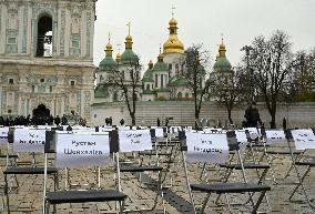 Empty Chairs human rights action in Kyiv