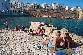 Swimmers Enjoying A Sunny October Sunday