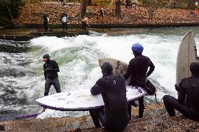 Surfers Brave The Icy Waters Of The Eisbach Stream In Munich In Autumn