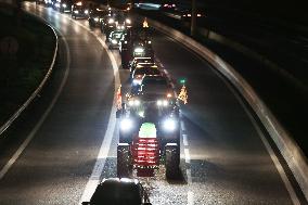 French Farmers Gather On The RN118 Road Southwestern Paris