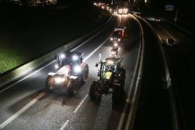 French Farmers Gather On The RN118 Road Southwestern Paris