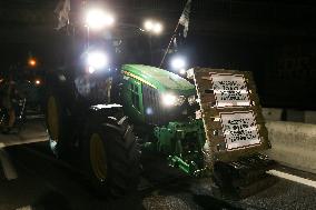 French Farmers Gather On The RN118 Road Southwestern Paris